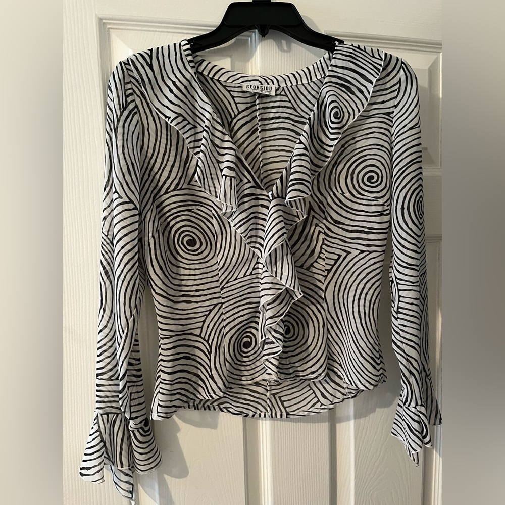 Women’s see through ruffle blouse. Size small